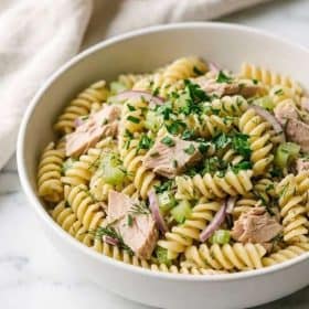 Tuna pasta salad in a white bowl